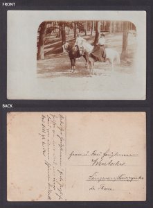 Vinatage postcard GERMANY RPPC Couple on a horse ride