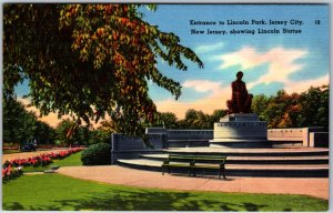 VINTAGE POSTCARD ENTRANCE TO LINCOLN PARK AND STATUE IN JERSEY CITY N.J.