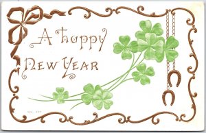 A Happy New Year Lucky Four Leaf Clover Golden Border Postcard