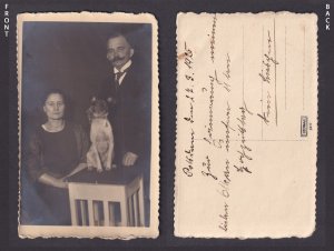 Vinatage postcard GERMANY RPPC Couple with a dog