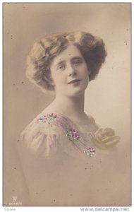 RP; Portrait of woman with short blond hair, colorful dot details, 20-30s
