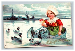 Vintage 1907 International Art New Year Postcard Dutch Girl Floating Shoe Ducks