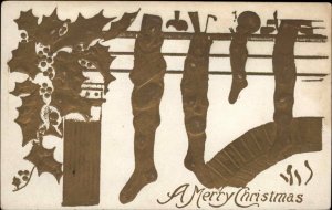 Christmas Block Printing Stockings Holly Embossed c1910 Vintage Postcard