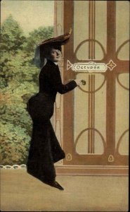 French Woman Outside Occupied Restroom c1910 Vintage Fashion Postcard