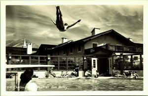 RPPC Man Diving into Challenger Inn Pool Sun Valley Idaho Real Photo Postcard