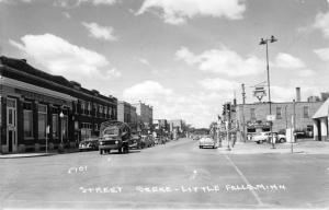 Little Falls MN~Street~Conoco Gas Station~Hub Sandwich Shop~Brass Rail~1955 RPPC 