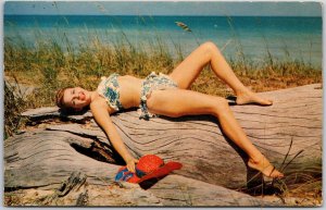 Woman Lying Down On Log Near The Beach Time Out For Sun Postcard