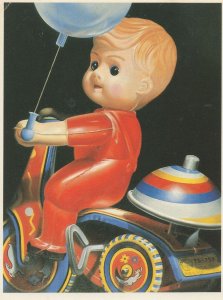 Dutch Toy Plastic Doll On Miniature Scooter Bike Postcard