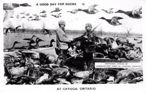 RPPC DUCK HUNTING Cayuga, Ontario Canada Giant Ducks Exaggeration Photo Postcard