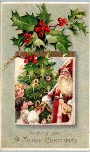 1900s Wishing You a Merry Christmas Santa with Children Holly Embossed Postcard