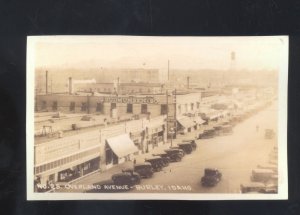 REAL PHOTO BURLEY IDAHO DOWNTOWN STREET SCENE OLD CARS STORE POSTCARD