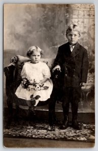 RPPC Cutest Brother and Sister Studio Photo Girl Curls Flowers Postcard F22