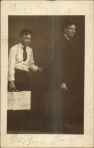 Studio Men w/ Suitcases Being Silly 1907 Real Photo Postcard