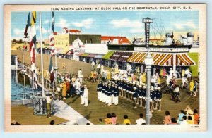 OCEAN CITY, New Jersey NJ ~ Boardwalk Flag Raising MUSIC HALL ca 1940s  Postcard