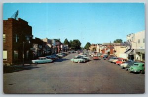 Grayling Michigan~Main Street~Sorenson's Sporting Goods~Station Wagon~Cars~1950s