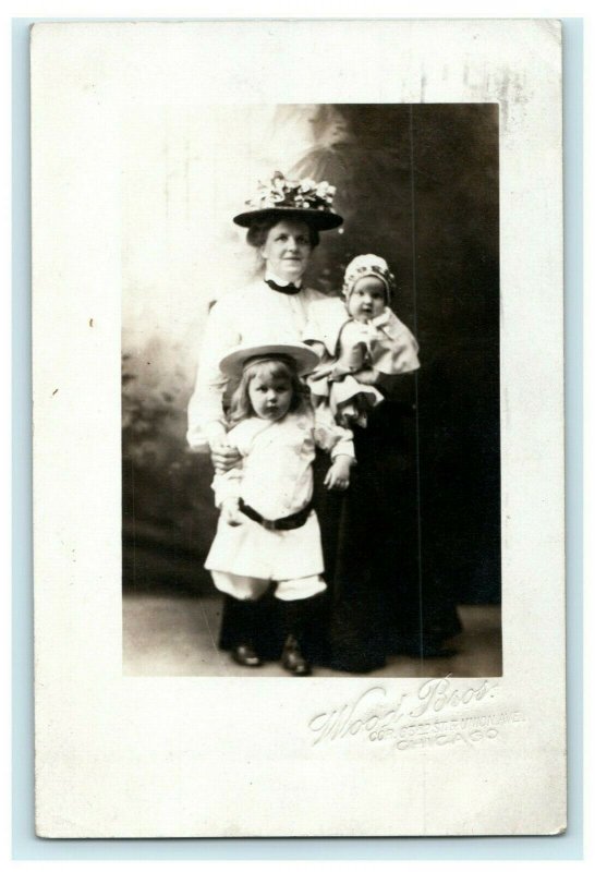 1909 Woman with Two Children Chicago Illinois IL Posted RPPC Photo Postcard 