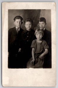 RPPC Children of the 1920s Portrait Photo Young Girl Boys Postcard J24