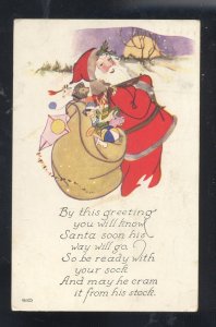 SANTA CLAUS WITH LARGE SACK OF TOYS VINTAGE CHRISTMAS POSTCARD 1920