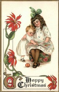 Tuck Christmas Children Big Sister Reads to Young Sibling c1910 Vintage Postcard