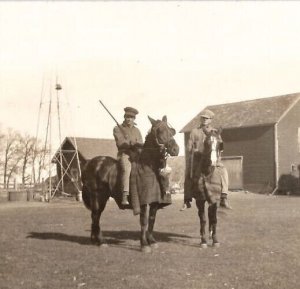 RPPC Two Handsome Men On Horseback With Rifles Dead And Rabbits Postcard S22