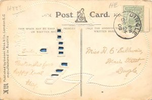 Hold to light Christmas 1908 hold to light, missing one plastic in building