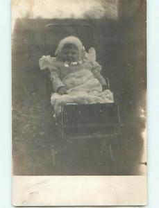 Pre-1920's rppc BABY IN FUZZY HAT IN ANTIQUE CARRIAGE STROLLER r6337