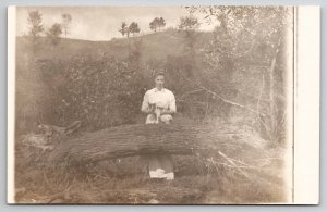 RPPC Edwardian Young Woman Posing With Her Cat On A Fallen Tree Postcard F47