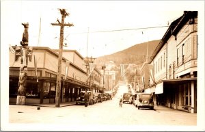 Real Photo Postcard Totem Pole Early Autos Main Street Ketchikan, Alaska