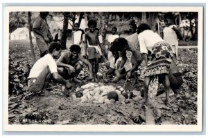 Fiji Postcard A Native Oven Putting Rocks on Pit c1930's Vintage RPPC Photo