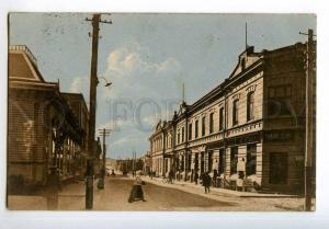 251624 FINLAND KUOPIO Shopping street Vintage RPPC TRAIN #10