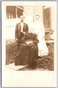 York Pennsylvania 1910s RPPC Real Photo Postcard Family Outside Man Woman