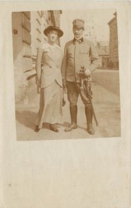 WWI RPPC Postcard Austro Hungarian Soldier Stand With Woman and sabre