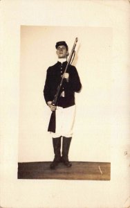 Real Photo Postcard Uniformed Soldier Holding Rifle~128406