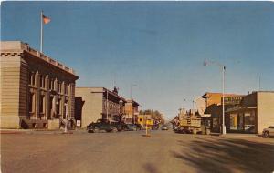 D67/ Rawlins Wyoming Wy Postcard Chrome Cedar Street Stores Autos Carbon Co