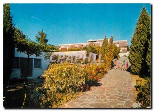 Postcard Modern Family Holiday Village The central pavilion seen from the par...