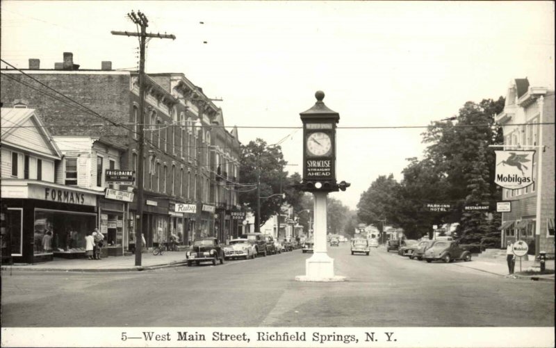 Richfield Springs NY West Main St. c1950 Real Photo Postcard STORES CARS