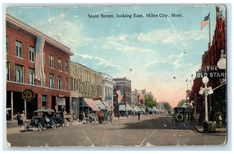 c1910 Old Stan Main Street Looking East Miles Ciy Montana MT US Flag Postcard