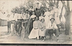 LARGE FAMILY GET TOGETHER-YOUNG MEN WITH BICYCLES~1910s REAL PHOTO POSTCARD