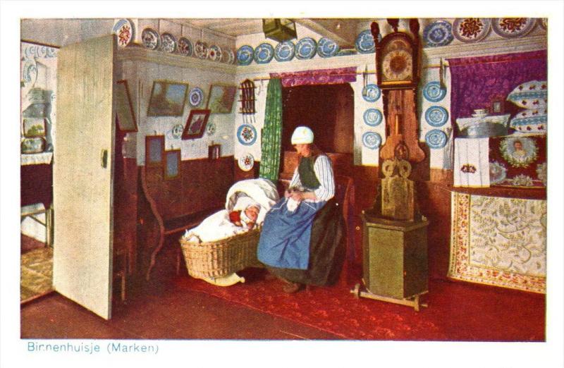 Holland Marken   Mother with baby in cradle