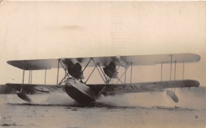 J70/ England RPPC Postcard c1930 Airplane Super Marine Floating 430