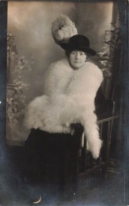 BEAUTIFUL  WOMAN-STYLISH ATTIRE-WHITE MINK STOLE-PLUME~1910s REAL PHOTO POSTCARD