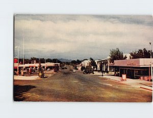 Postcard Typical street scene of business district in Boulder City, Nevada