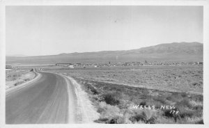 J81/ Wells Nevada RPPC Postcard c1940-50s Highway Town View 237