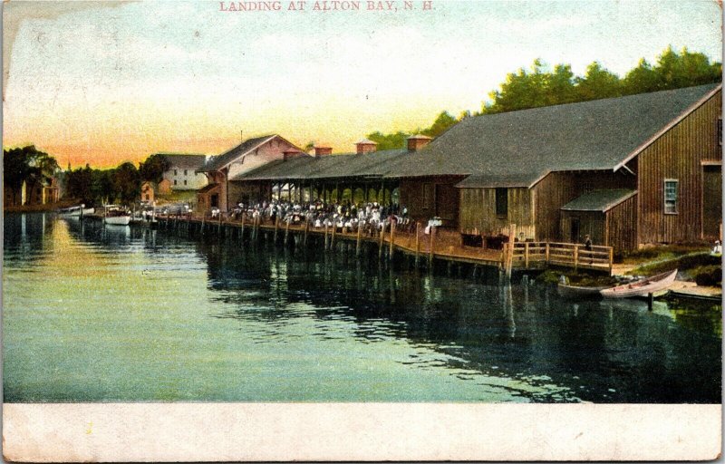 Postcard NH Alton Bay Tourists Waiting for Boat at Landing Canoes 1910 S89