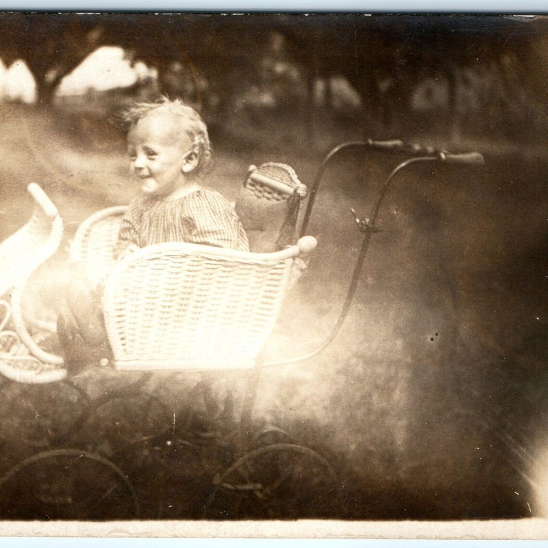 c1910s Radiant Smiling Baby RPPC Wicker Stroller Photo Beautiful Lens Flare A142