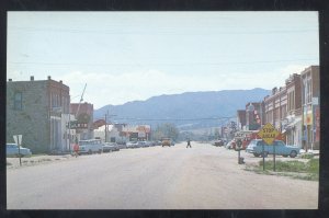 BOULDER MONTANA DOWNTOWN STREET SCENE OLD CARS STORES VINTAGE POSTCARD