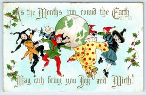 NEW YEAR GREETING  Unsigned HB Griggs  GLOBE~Dancing JESTERS  1911    Postcard