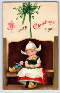 Christmas Postcard Ellen Clapsaddle Girl Wooden Shoe Doll Artist Signed Germany