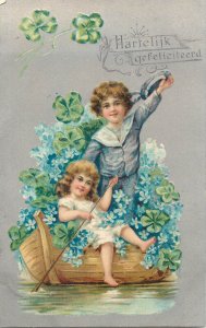 Lovely drawn embossed children couple luck shamrock floral boat fantasy postcard 