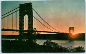 M-70201 Sunset silhouettes the George Washington Bridge Fort Lee New Jersey